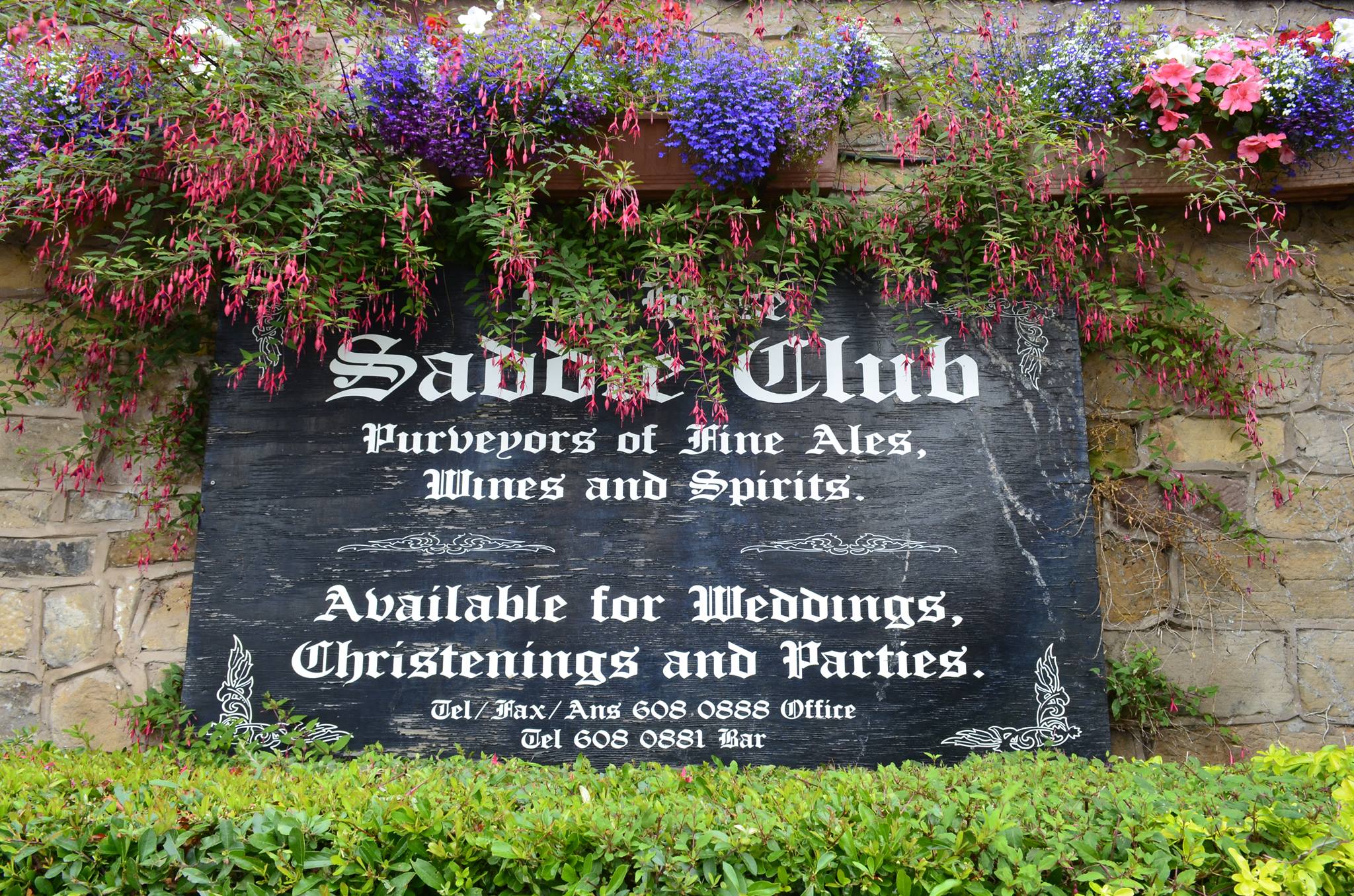 Sign advertising venue for weddings and parties.